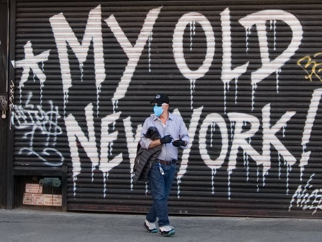 man with sanitation accoutrement