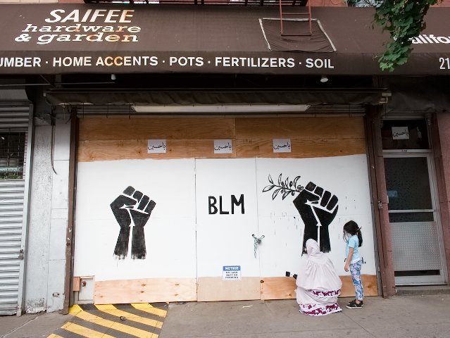 Black Lives Matter on storefront plywood